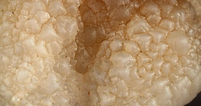 Close-up of chalcedony stone Morocco. Gem on a light background.