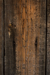 Obraz premium texture of old raw wood close-up. the texture of the boards, all the cracks and small details are clearly visible. close-up. photo can be used as a photo background, as a texture for 3D models