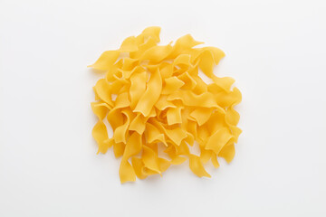 Raw pasta isolated on white background.