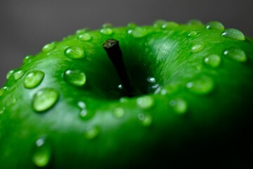 green apple with water drops