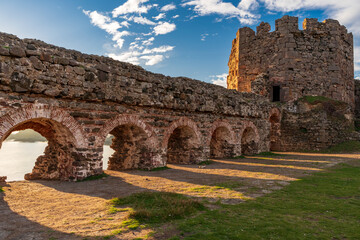 Rumelifeneri Castle with old fort. Blue sky and natural white clouds.