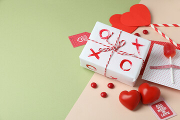 Valentine's Day accessories on two tone background, space for text