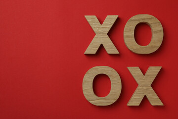 Valentine's Day concept with XO letters on red background