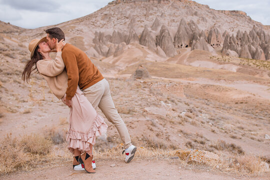 Happy couple on summer vacation in famous place. Cave formations.