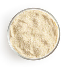 Semolina flour in glass bowl isolated on white background with clipping path