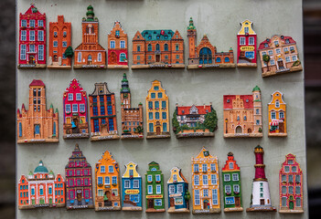  Rows of fridge magnet souvenirs from Gdansk displayed on stillage. Poland
