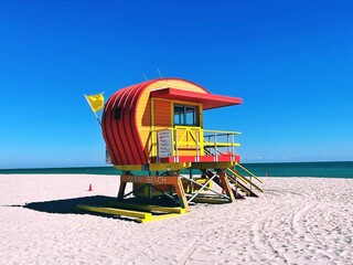 13th Street Lifeguard tower with yellow flag flying, Miami beach, Miami, Florida, USA