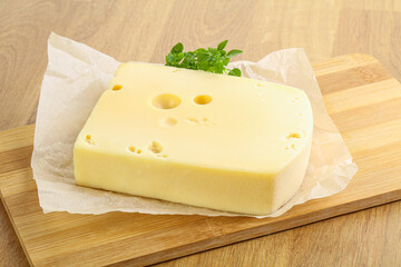 Maasdam cheese over the board