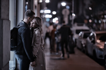 couple in love winter Budapest, tourism Hungary, a young couple a walk around the city in the evening