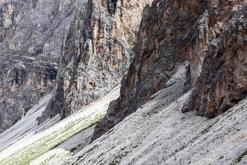 Fototapeta na wymiar Dolomite slopes with crumbling rock. Italian Alps
