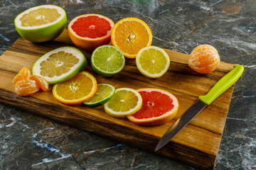 Citrus fruits. Oranges, lime, lemon, mandarins, citrus, pomelo, and grapefruit
