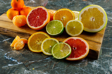 Citrus fruits. Oranges, lime, lemon, mandarins, citrus, pomelo, and grapefruit