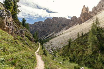 A gorge with a scenic trail in the Dolomites. Natural park Puez Odle. Italian Alps