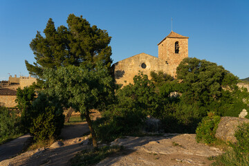 Fototapeta na wymiar VIew of the medieval village of Siurana with its church at sunset.