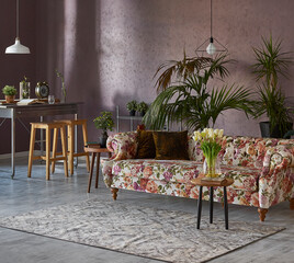 Flower pattern sofa with metal kitchen table, long chair and vase of green plant botanic style, white lamp.