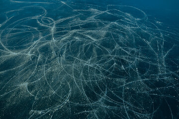 ice traces of skates texture, abstract background, top view aerial photography traces of hockey skates