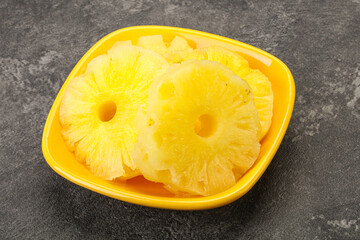 Sweet pineapple rings in the bowl