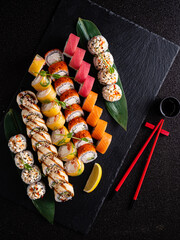 tasty sushi on the black background