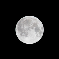 full moon over black sky