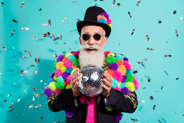 Photo of charming pretty senior hipster wear craft pop-pom blazer dancing holding disco ball...