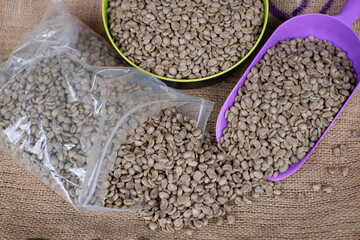 raw coffee beans or green beans. top view of coffee with fullwash method ready to be roasted 