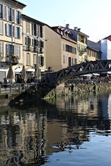 Fototapeta premium Italy, Milan: Foreshortening of the bridge on the Naviglio.