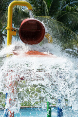Splashing water attraction that can be found at water parks
