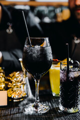 Dark drink in a glass glass