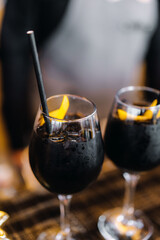 Dark drink in a glass glass