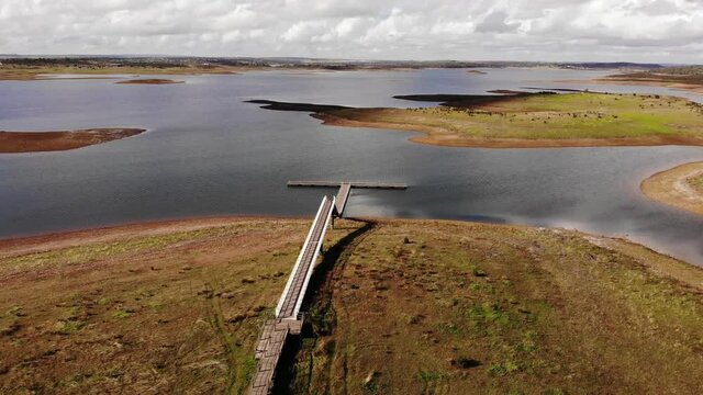 Aerial view of Alqueva Dam artificial lake from village Aldeia da Luz, Alentejo tourist destination region, district of Evora, Portugal.