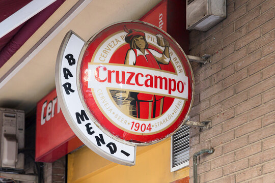 VALENCIA, SPAIN - DECEMBER 09, 2021: Cruzcampo is a Spanish brewery. It is part of the Heineken corporation