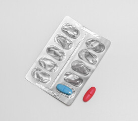 Packs of pills blue and red choice