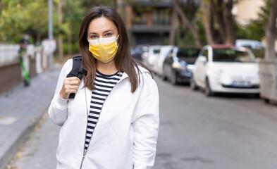 Fototapeta premium Young woman in medical face protection mask.