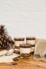 Creamy cake presented in a crystal glass.