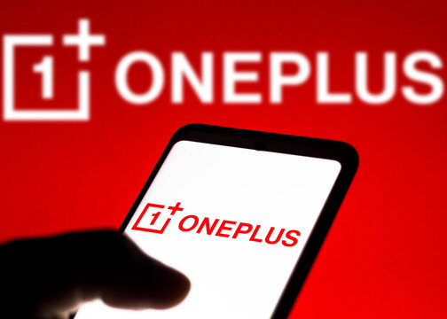 December 14, 2021, Brazil. In this photo illustration the OnePlus logo seen displayed on a smartphone and on the background.