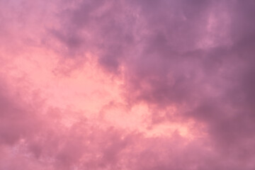 Purple, violet and pink clouds at sunset. Abstract background.