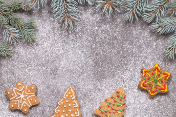 Various cookies and pine tree branches - 474883384