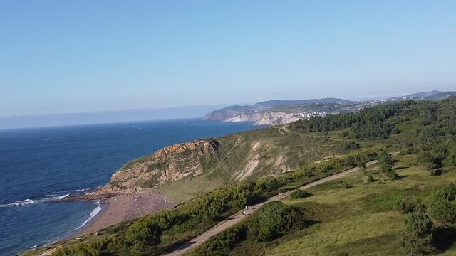 aerial footage of cliffs in the sea, in the coast of the basque country