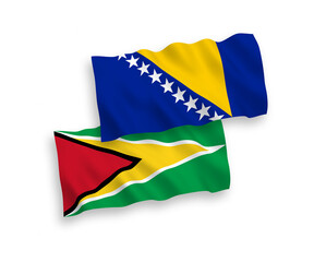 Flags of Co-operative Republic of Guyana and Bosnia and Herzegovina on a white background