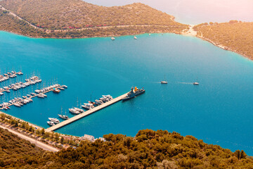 Charming panoramic aerial view of seaside resort town. Harbor with port and marina. Mediterranean...