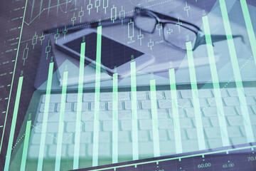 Double exposure of forex chart drawing and cell phone background. Concept of financial trading