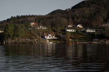 Fototapeta na wymiar Landscape of hilly area of island in Lusefjord. Beautiful nature on sunny day.