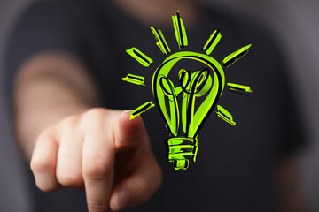 hand holding eco light bulb energy concept