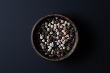 red, white and black pepper
