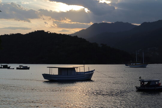 Araujo island landscape, in Paraty, Brazil, during sunset. Serra da Bocaina on the background. 