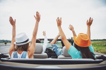 Friends in cabriolet