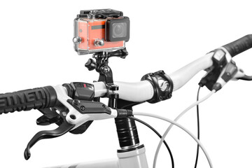 Modern orange action camera inside protection box attached on a bike, isolated
