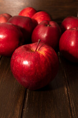Ripe red apples in wooden box. Top view