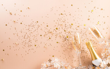 Happy new year celebration background concept made from champagne and glasses on pastel background.