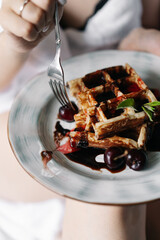 Viennese waffles with jam and berries